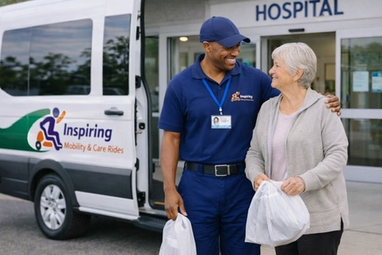 Inspiring Care Rides driver and patient smiling outside a hospital